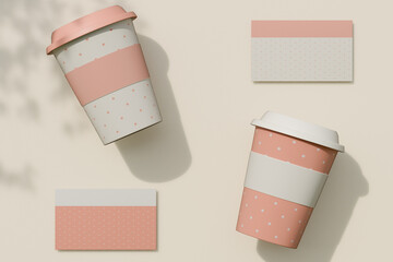 Pink and white disposable coffee cups with matching business cards on a beige surface. 3d rendering
