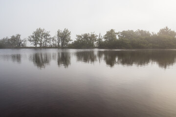 Foggy September morning at a lake
