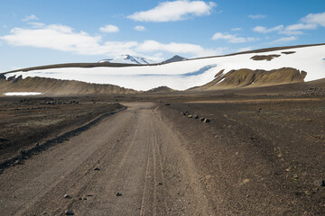 Lonely gravel road in the icelandic highland