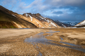 Sunset at Landmannalaugar in Iceland with colorful mountains in background