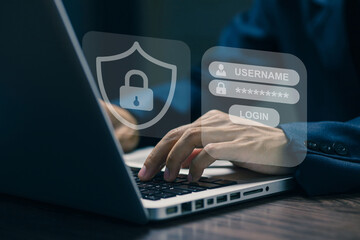 Business concept hand typing on laptop with login graphic and security icons, conveying cyber security, login and data privacy.