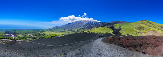 Smoke rising from Mount Etna’s peak early in the morning © J