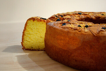 Delicious Sponge Cake Slices with Cheese, Raisins and Almonds