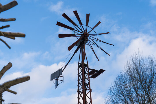 Zl&iacute;n, Czech Republic - February 15, 2025: Old wind pump. Old weather vane