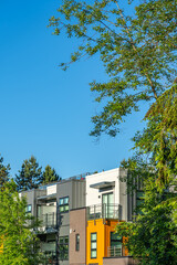 Top of modern apartment building with nice windows in Summer in Vancouver, Canada, North America. Day time on May 2025.