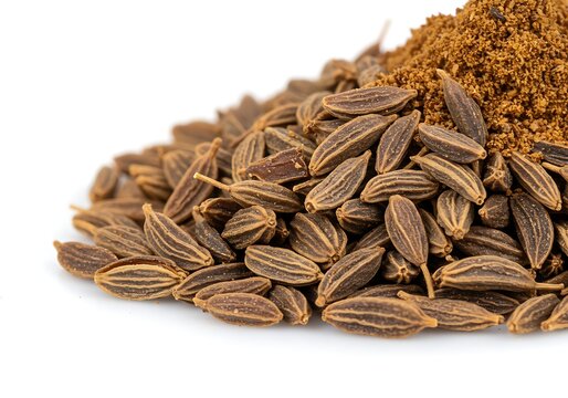 A heap of cumin seeds and ground cumin spice