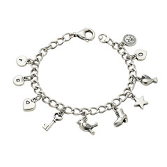 A polished silver charm bracelet with a delicate chain and detailed charms (heart, key, bird, star, boot), on a transparent surface with bright, even lighting, no shadows, commercial jewelry