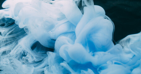 Haze wave. Ink steam. White blue liquid swirl spreading on black background. Blur color abstract contrast pigment underwater floating.