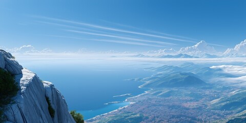 Majestic mountain overlooking coastal city and vast ocean on a clear day