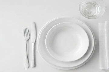 collection of elegant tableware items on clean white background with soft shadows