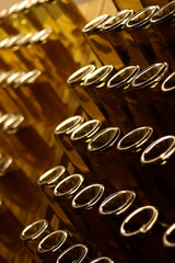 Production of carbonated apple cider. Glass bottles with cider in an inverted state with selective...