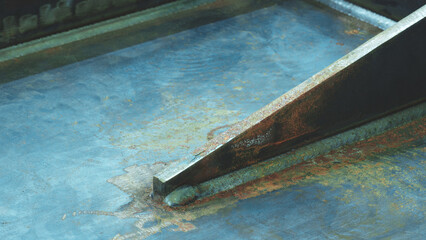A weld seam attaches a metal part to another metal surface, metal welding industrial reliability...