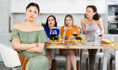 Quarrel during friendly gatherings, three women friends yell at their Asian class mate sister, offend, say offensive words, accuse them of lying, accuse of inappropriate behavior, gossip