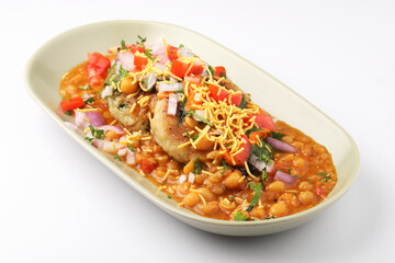 Indian Food-Ragda Pattice is popular street food of India. Ragada is a curry made of yellow vatana & pattice is made of potatoes along with spices. garnished with Sweet & mint chutney, chopped onions