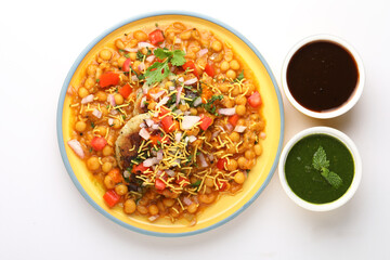 Indian Food-Ragda Pattice is popular street food of India. Ragada is a curry made of yellow vatana & pattice is made of potatoes along with spices. garnished with Sweet & mint chutney, chopped onions