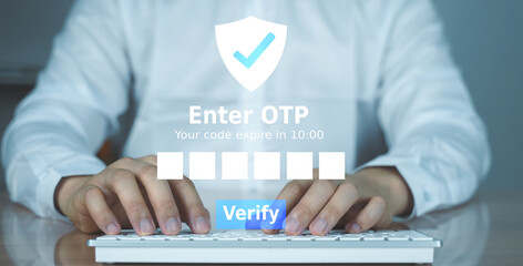 Close-up of hands entering a one-time password (OTP) on a virtual login interface. Concept of cybersecurity, online verification, and digital trust.