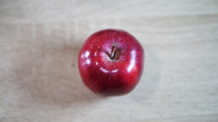 Fresh red apples just picked on the table at night