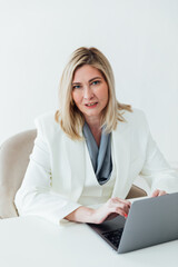 Woman in business working with laptop in office