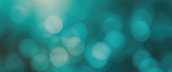 Fototapeta premium Abstract image with blurred blue and green bokeh lights.