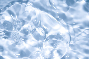 The surface of the water is clear, blue, soft and shiny.