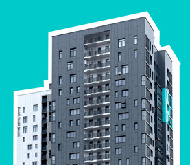 Tall modern apartment building with structured facade and multiple windows. Urban highrise