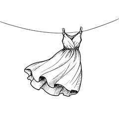 Flowing summer dress hanging on drying line