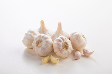 Garlic bulb bunch on white background