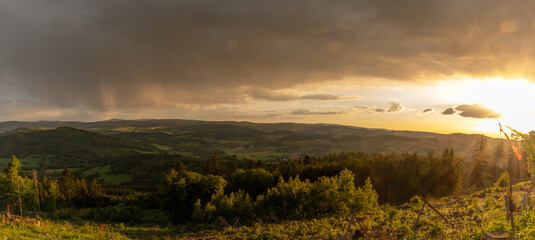 Obraz premium Spring sunset view from hill Svatobor near town Susice in south west Bohemia