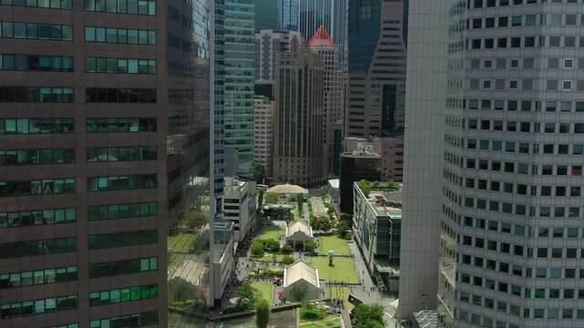 day time singapore city downtown modern office buildings famous square aerial panorama 4k 