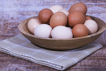 close-up of many chicken eggs on a plate