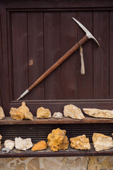 A collection of stones and a pickaxe