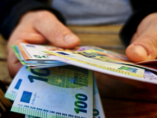 euro bank notes, paying in the european union
