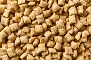 corn pads texture, close up, top view. Crispy corn pads as background.