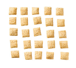 Tasty corn pillows isolated on white background top view.
