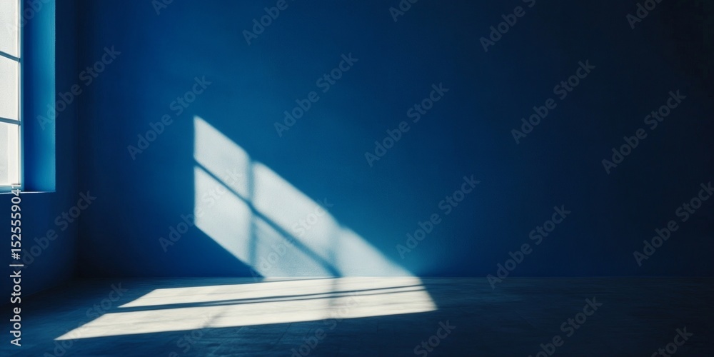 Poster the room is painted in a deep blue with a large window allowing natural light to pour into the space