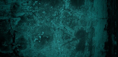 A textured background featuring a deep teal color with a distressed, grunge appearance. The surface shows variations in tone and subtle patterns, creating an abstract and moody aesthetic.