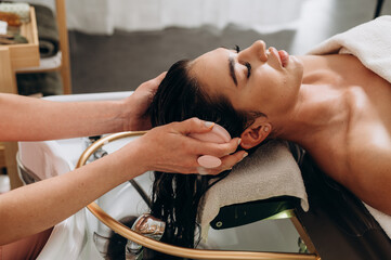 "Spa scalp shampoo session with foaming bubbles and vibrating electric massager for relaxation