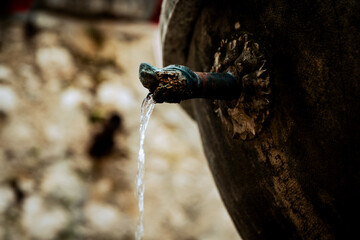 Naklejka premium St. Paul De Vence, France - July 3, 2014: A water fountain in the hillside village of St. Paul De Vence, France 
