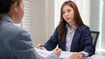 Expert woman asian people discuss review data number costing managerial account prepare monthly actual cost variance report income tax at audit office. ESG budget control ERP process service project.