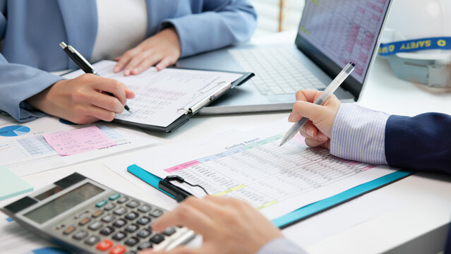 Expert woman asian female people review data number costing managerial account prepare monthly actual cost variance report income tax at audit office. ESG budget control ERP process service project.