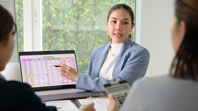 Expert woman asian people discuss review data number costing managerial account prepare monthly actual cost variance report income tax at audit office. ESG budget control ERP process service project.