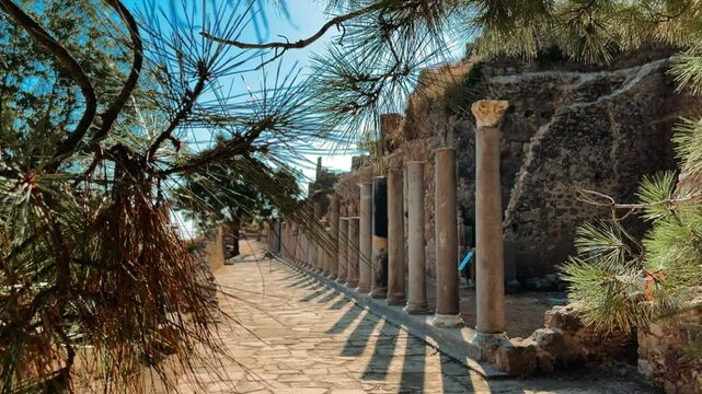 Ruins of the ancient Roman port city of Siedra in Alanya, Antalya, Turkey. The street and ruins of the ancient abandoned ancient city of Siedra on the Mediterranean coast. 4К	