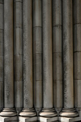 Fototapeta premium Stone pillars on door of church for use as a background texture