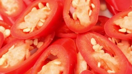 Close-up View of Sliced Red Chili Peppers, Seeds Visible - Powered by Adobe