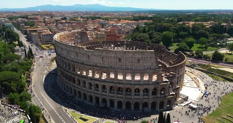 Epic Daytime Aerial of the Colosseum in Rome: Stunning Drone Footage Capturing Ancient History and Architecture in the Heart of Italy - Powered by Adobe