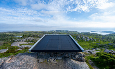 modern panoramic viewpoint with rugged coastal landscape.