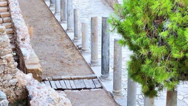Ruins of the ancient Roman port city of Siedra in Alanya, Antalya, Turkey. The street and ruins of the ancient abandoned ancient city of Siedra on the Mediterranean coast. 4К	