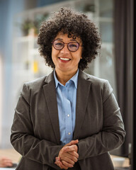 mature african american businesswoman leader stand in office