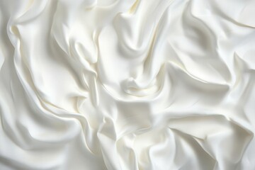 Obraz premium Cream draped silk fabric texture isolated on white background