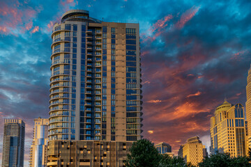 Skyscrapers, office buildings and hotels in the city skyline at Romare Bearden Park in uptown Charlotte North Carolina USA